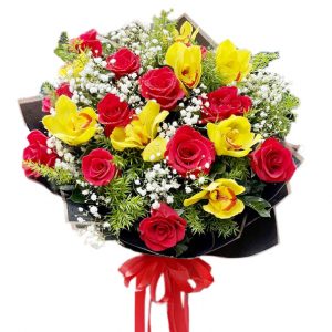 Red roses and yellow orchids