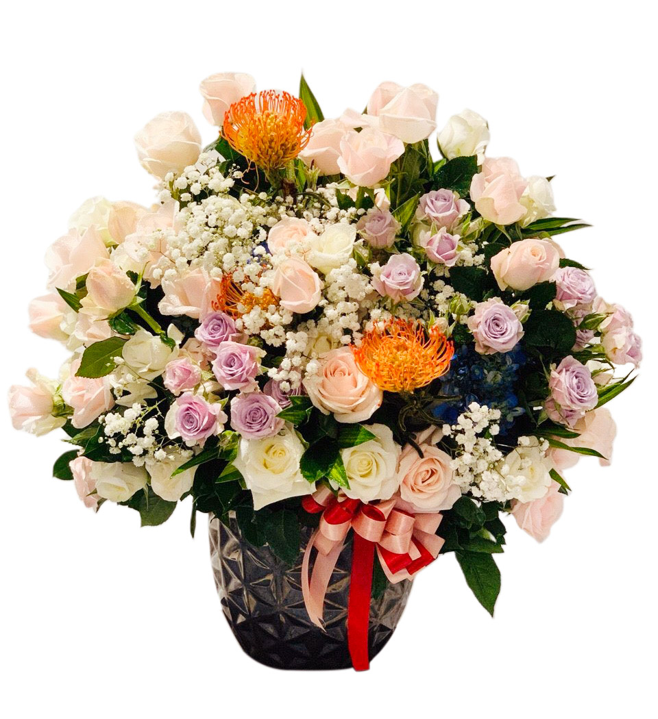 Two dozen of assorted roses in a vase - Viet Flowers